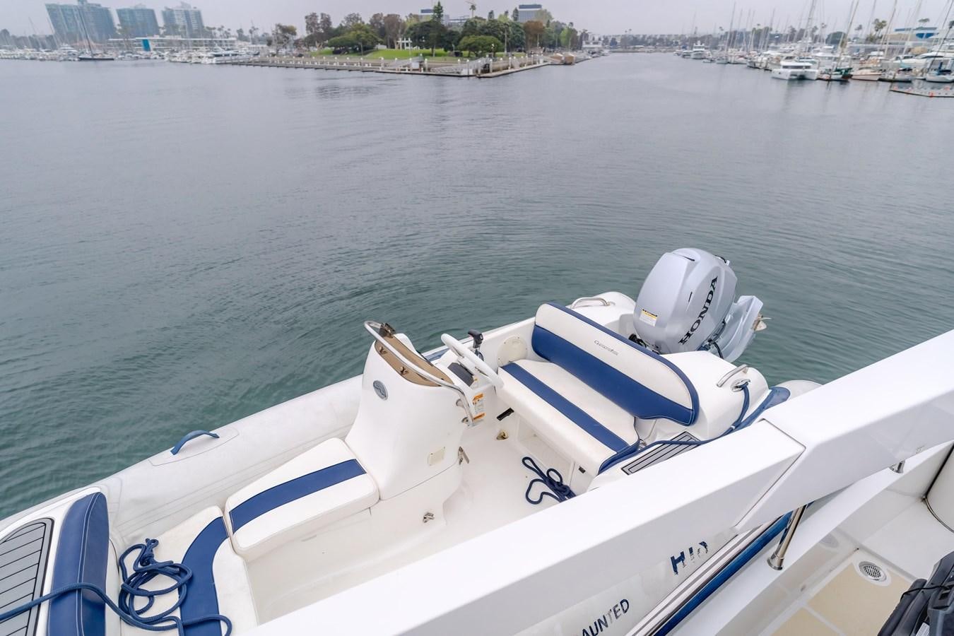 a boat on the water aboard UNDAUNTED Yacht for Sale