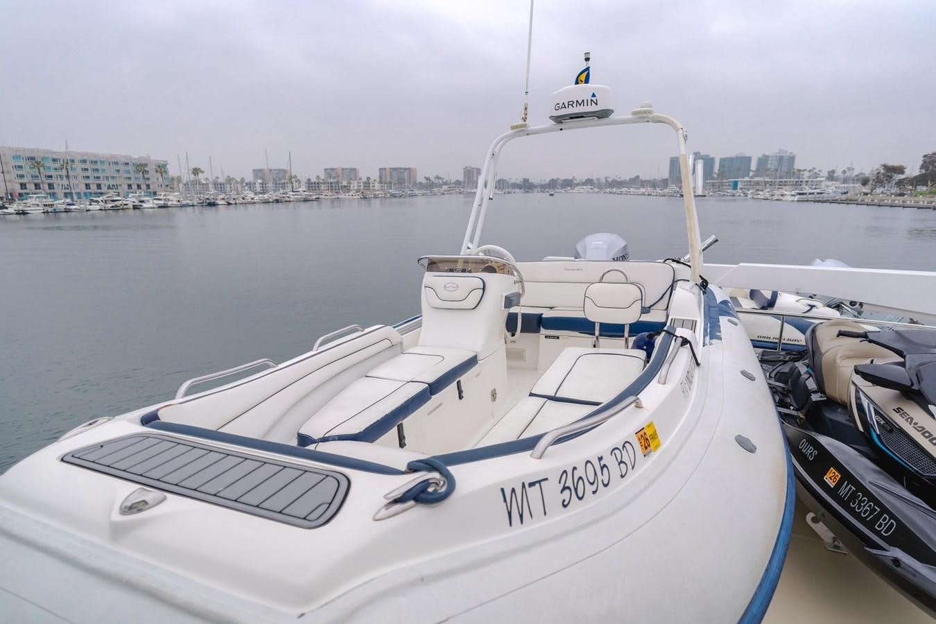 a boat with a white front aboard UNDAUNTED Yacht for Sale
