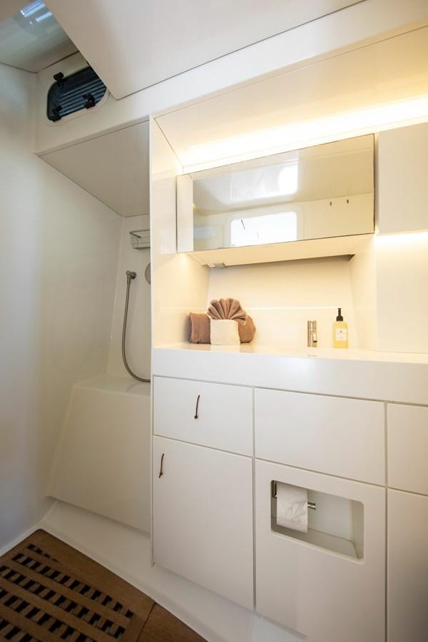 a white cabinet with drawers aboard PEREGRIN Yacht for Sale