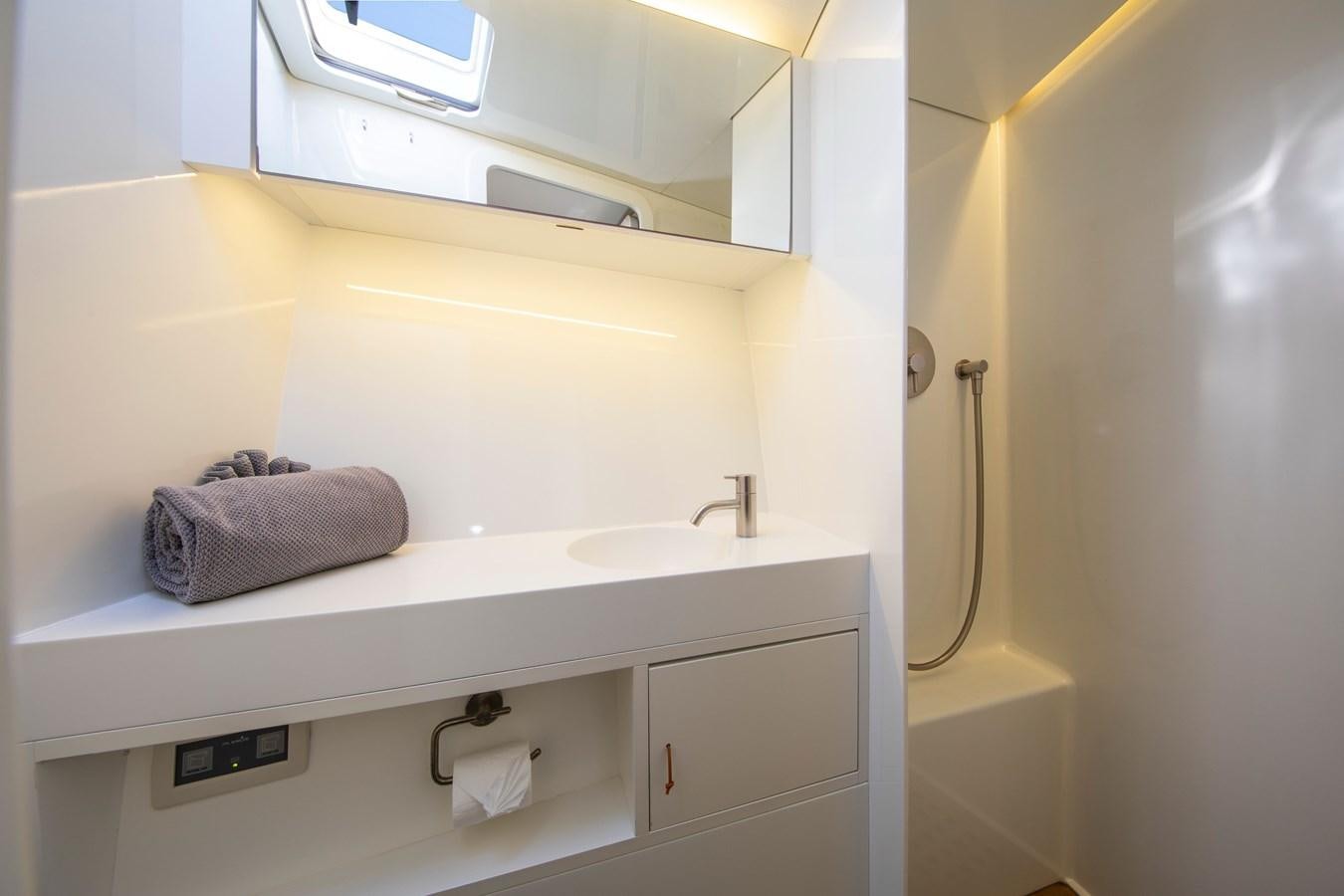 a bathroom with a towel rack aboard PEREGRIN Yacht for Sale