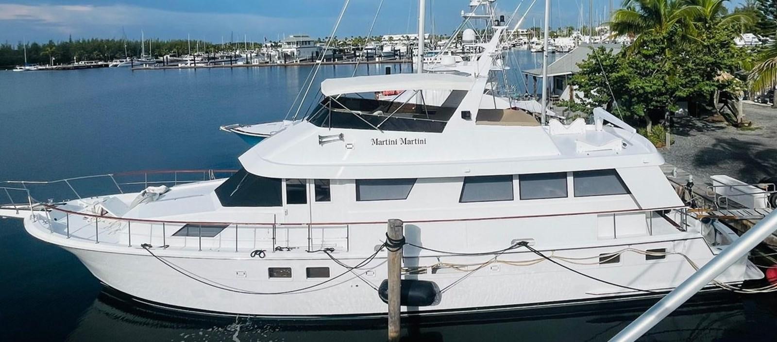 a white yacht in the water aboard MARTINI MARTINI Yacht for Sale