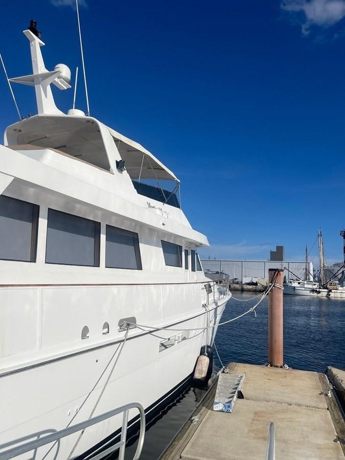 a boat docked at a pier aboard MARTINI MARTINI Yacht for Sale