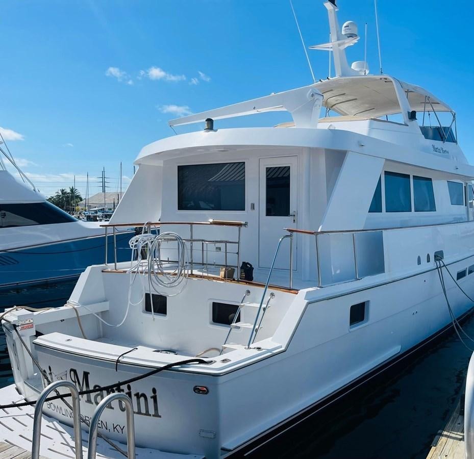 a white yacht docked aboard MARTINI MARTINI Yacht for Sale
