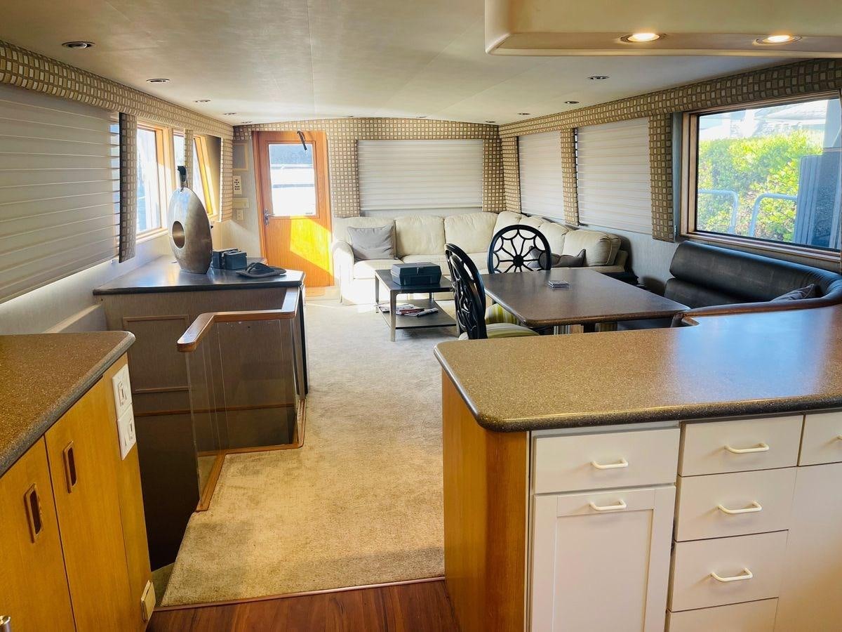 a kitchen with a large island aboard MARTINI MARTINI Yacht for Sale