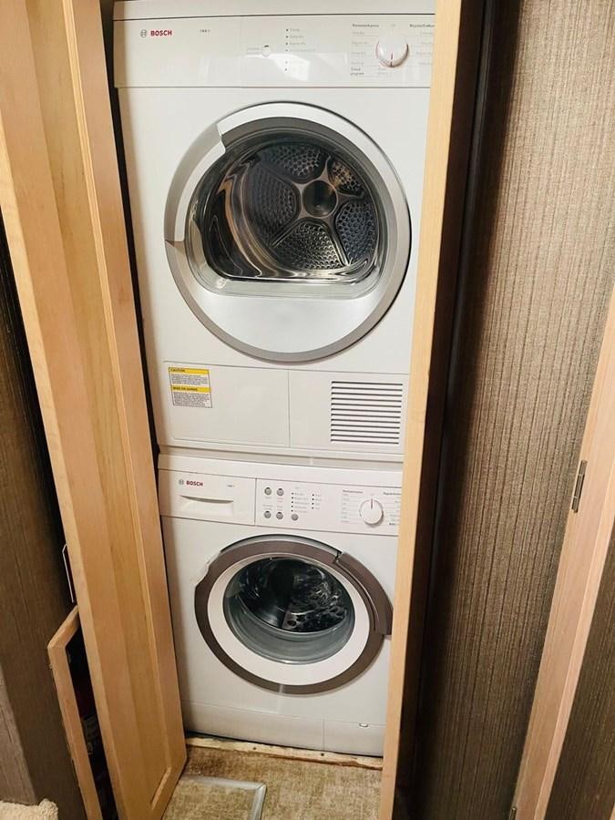 a washing machine in a room aboard MARTINI MARTINI Yacht for Sale
