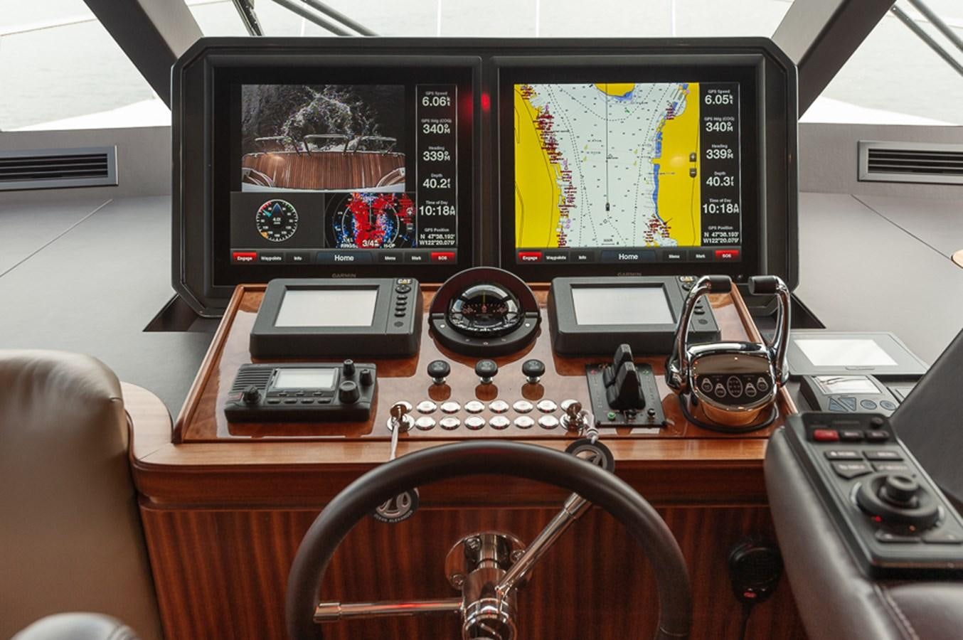 a computer with a monitor and other electronics on it aboard FOREVER INTREPID Yacht for Sale