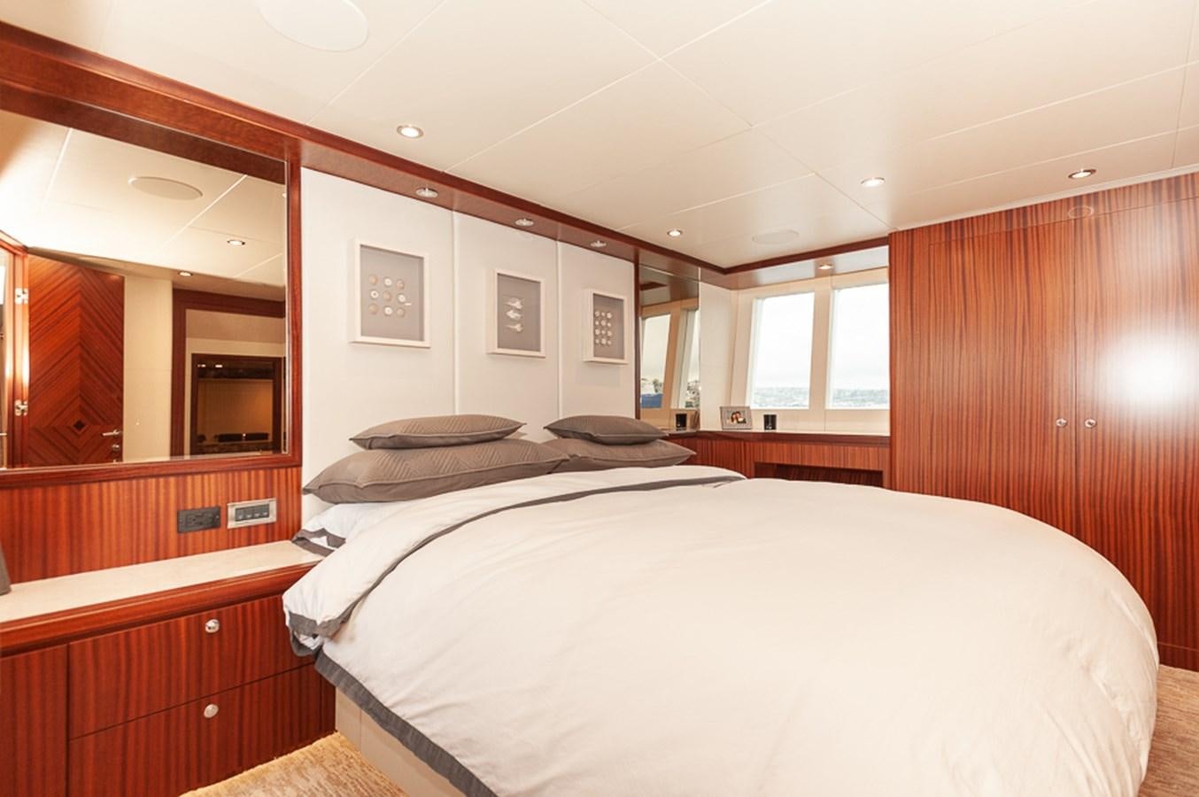 a room with two beds aboard FOREVER INTREPID Yacht for Sale