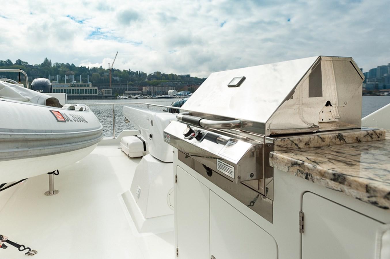 a boat on a dock aboard FOREVER INTREPID Yacht for Sale