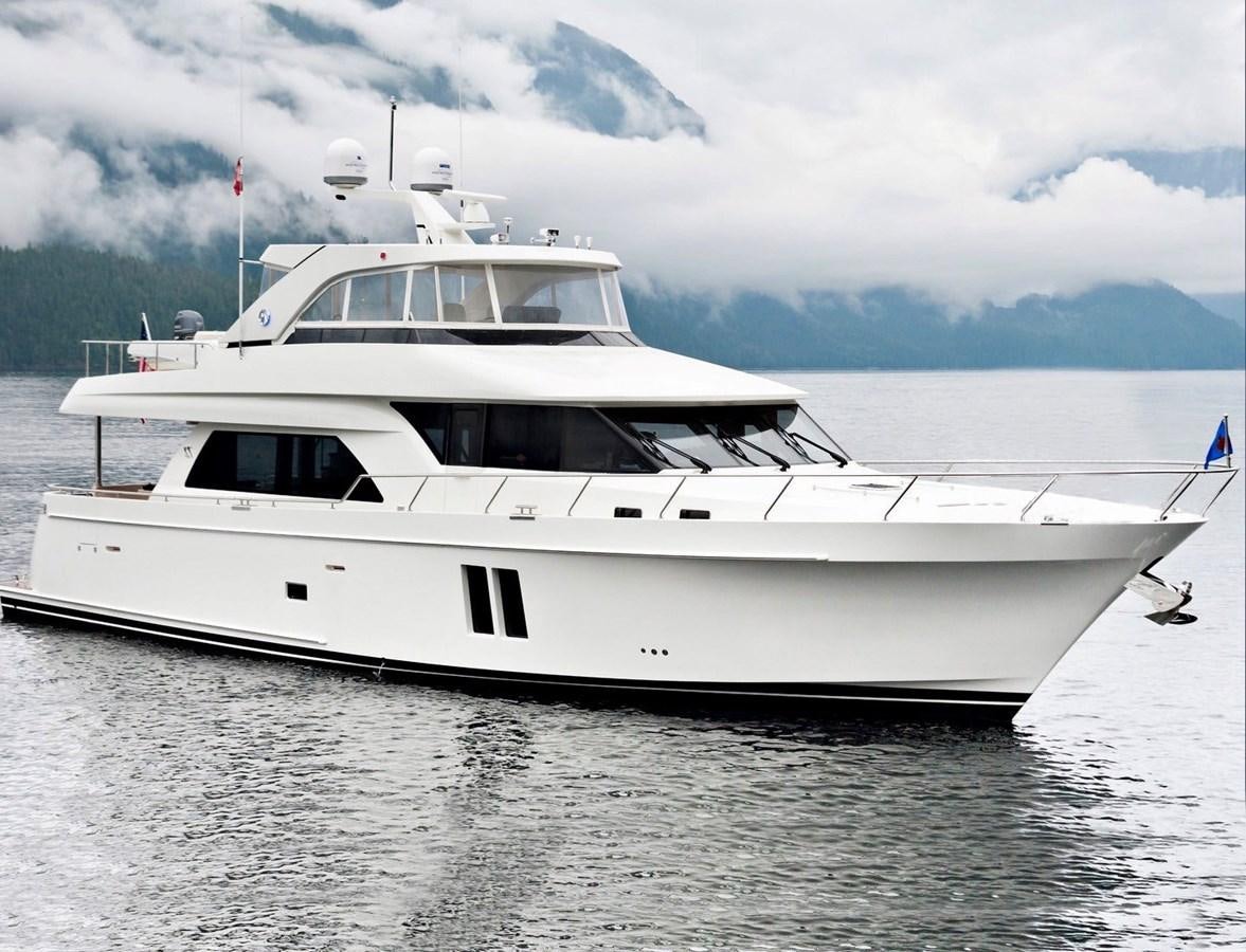 a white yacht in the water aboard FOREVER INTREPID Yacht for Sale