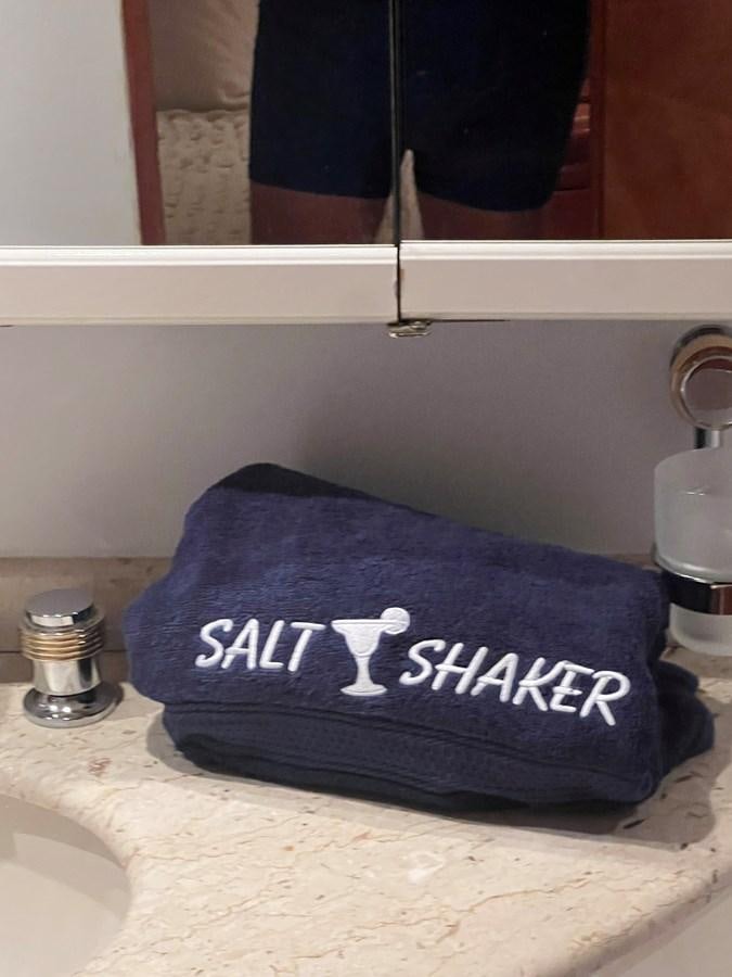 a blue hat on a counter aboard SALT SHAKER Yacht for Sale