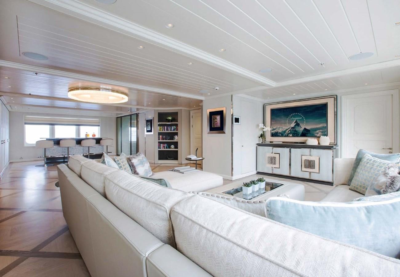a living room with a large window aboard POLAR STAR Yacht for Sale