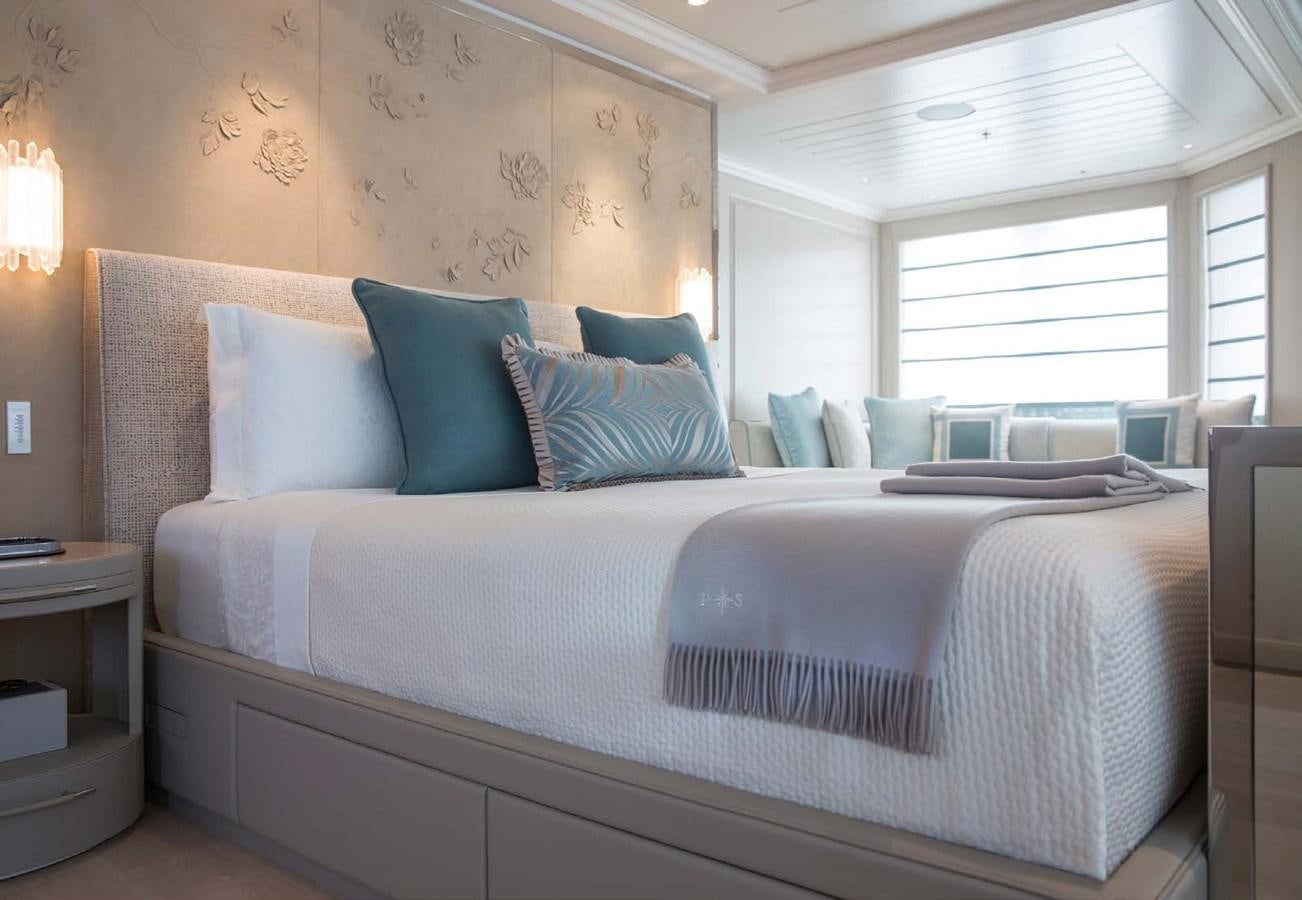 a bed with a white sheet aboard POLAR STAR Yacht for Sale