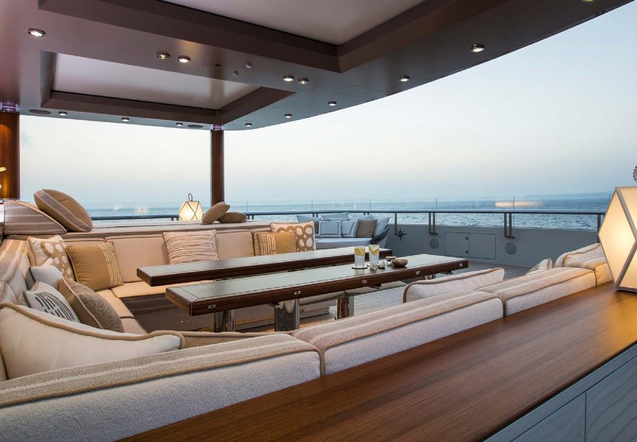 a room with a couch and a table aboard POLAR STAR Yacht for Sale
