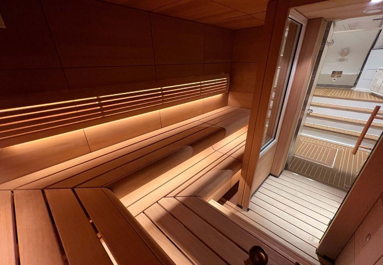 a wooden staircase with a railing aboard POLAR STAR Yacht for Sale