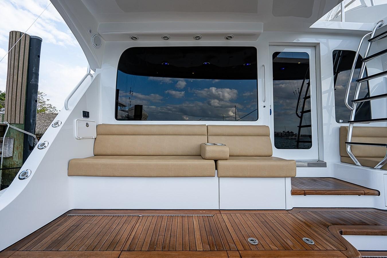 inside of a white car aboard INSTIGATOR Yacht for Sale