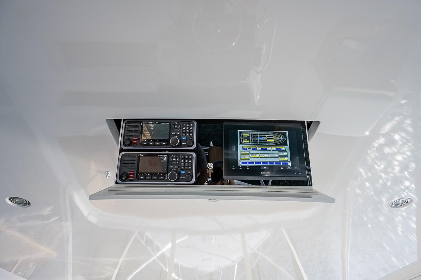 a device with a screen and buttons aboard INSTIGATOR Yacht for Sale