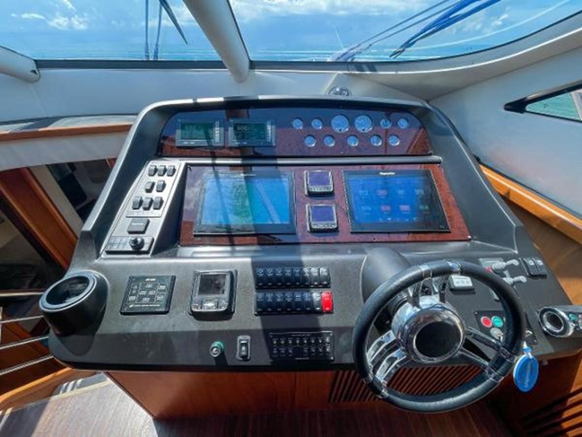 the inside of a car aboard TWINS Yacht for Sale