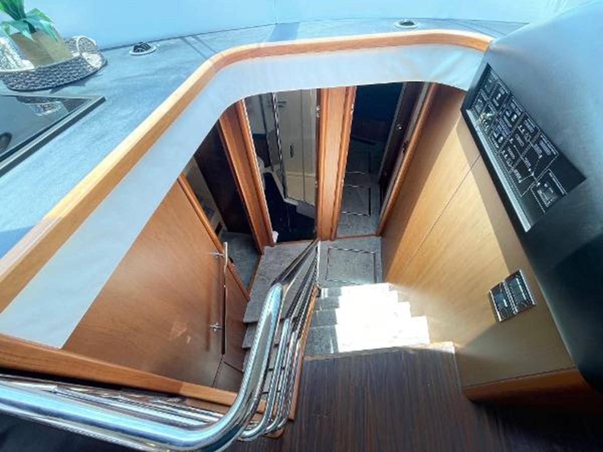 a wooden boat with a metal frame aboard TWINS Yacht for Sale