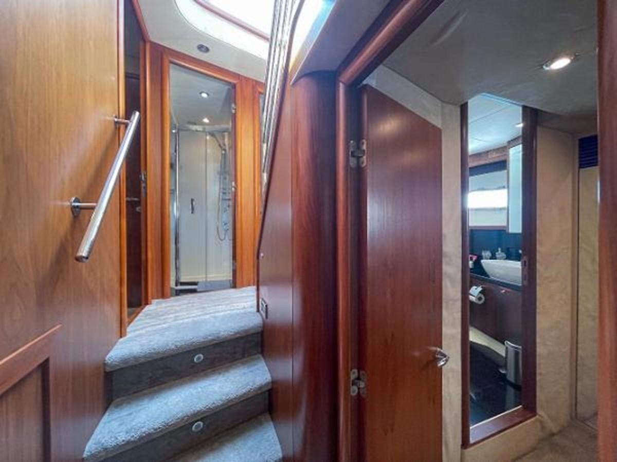 a wood door leading to a room aboard TWINS Yacht for Sale