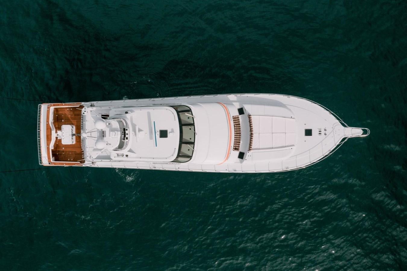 a white boat in the water aboard PRIME TIME Yacht for Sale