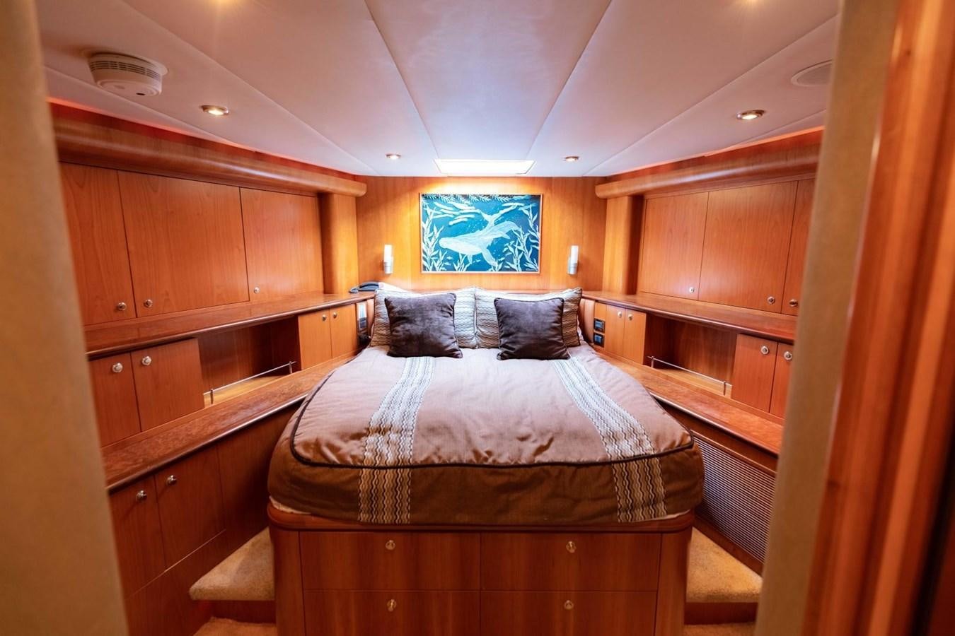 a bed in a cabin aboard PRIME TIME Yacht for Sale
