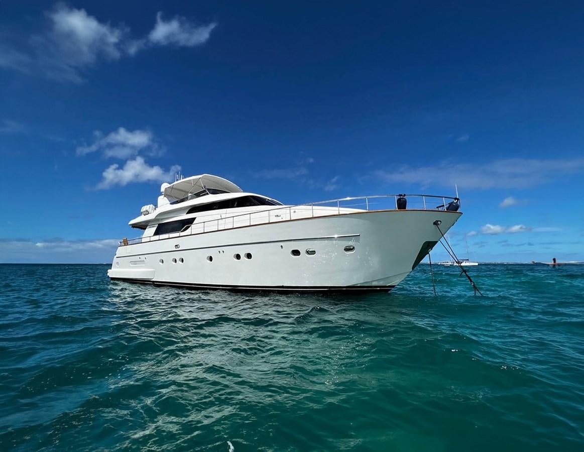 a white boat in the water aboard KOKO Yacht for Sale