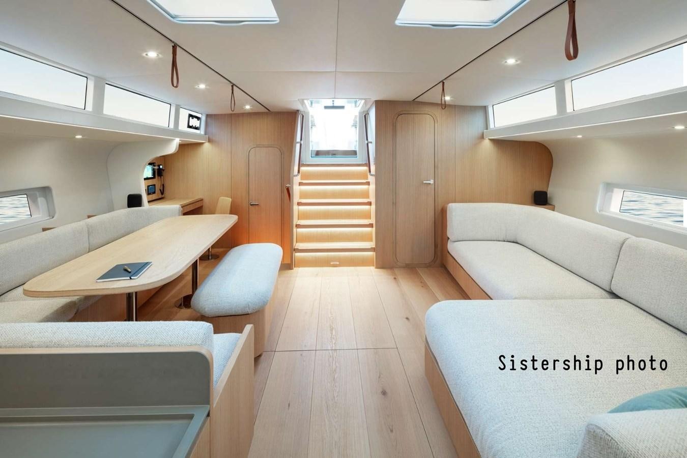a room with a couch and a table aboard Y7-70 Yacht for Sale