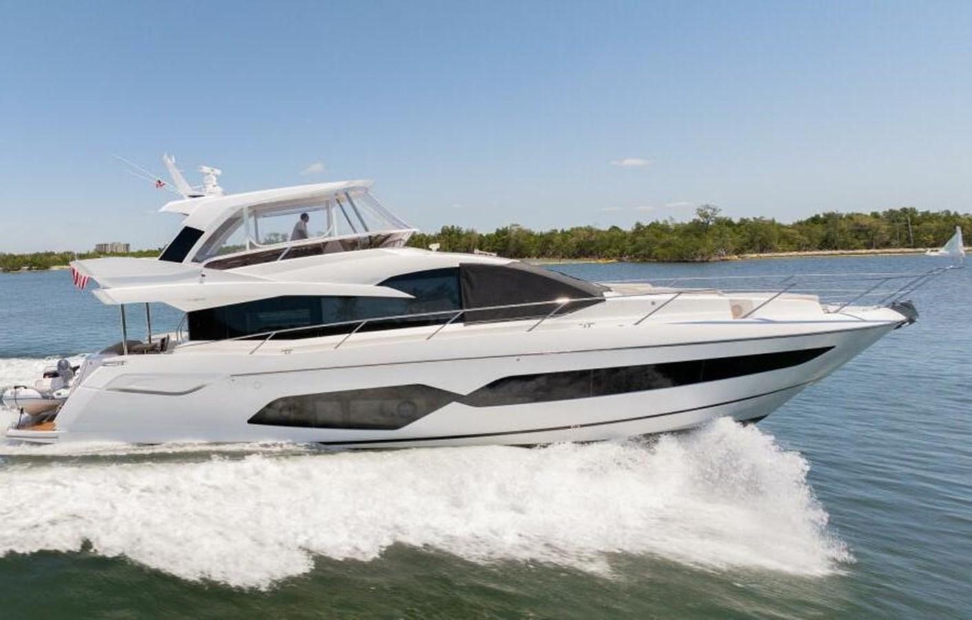 a white yacht on water aboard SEA ZAR Yacht for Sale
