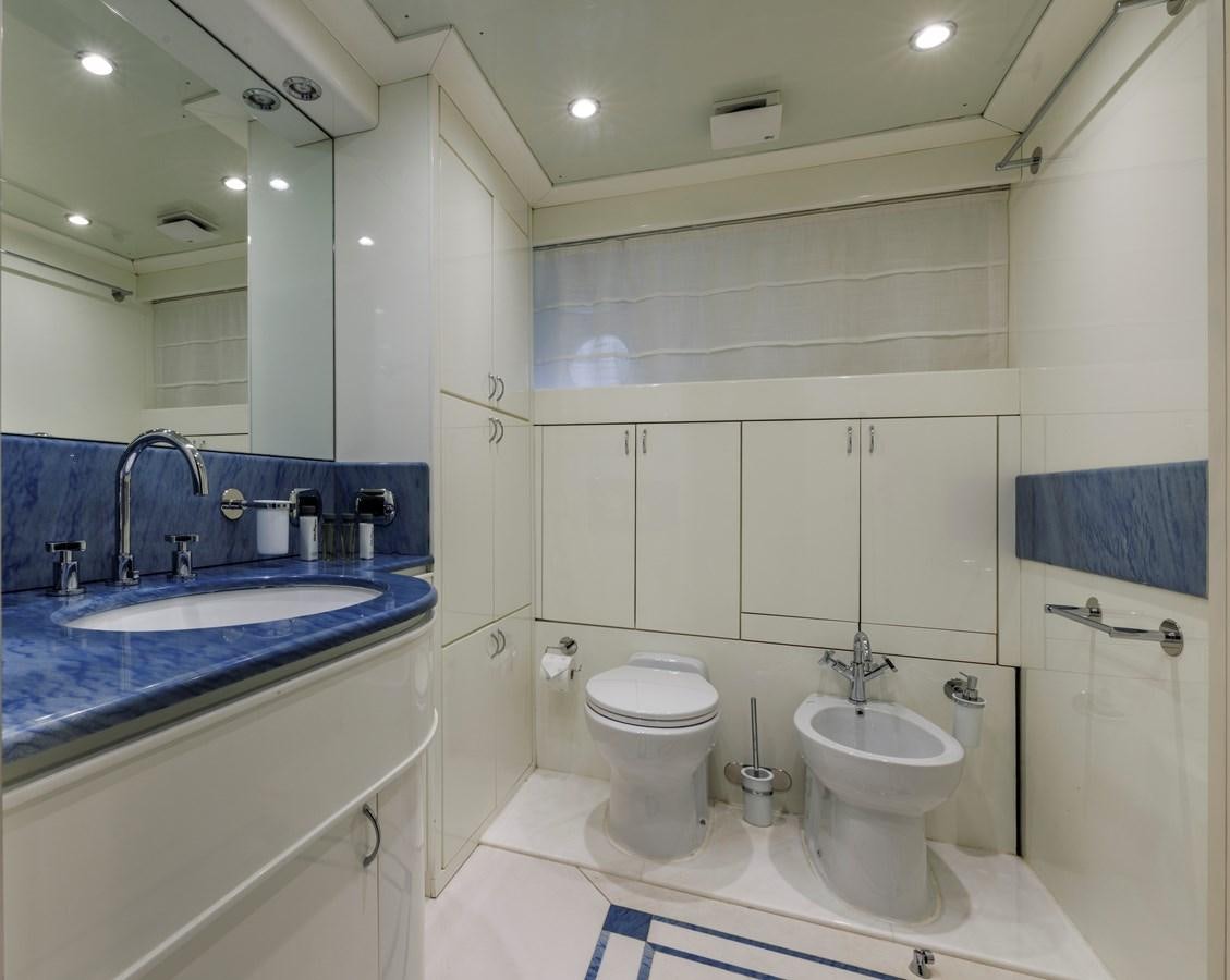 a bathroom with a sink toilet and a bathtub aboard DON CIRO Yacht for Sale