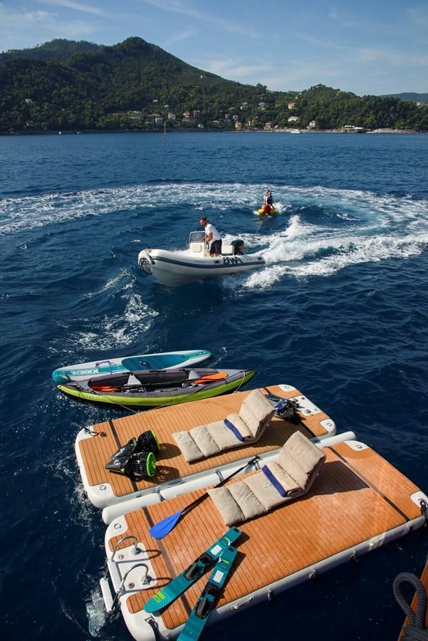 a boat is moving on the water aboard DON CIRO Yacht for Sale