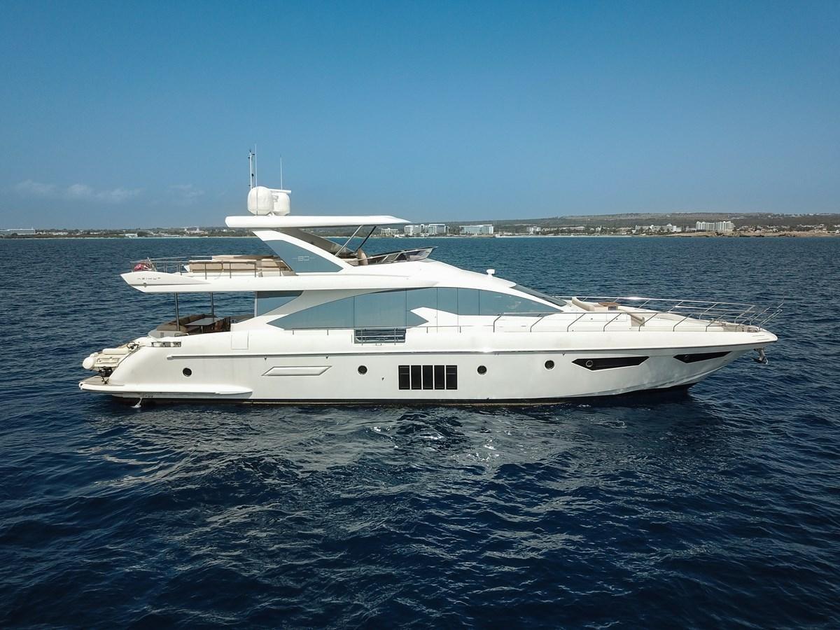 a white yacht in the water aboard ALINA Yacht for Sale