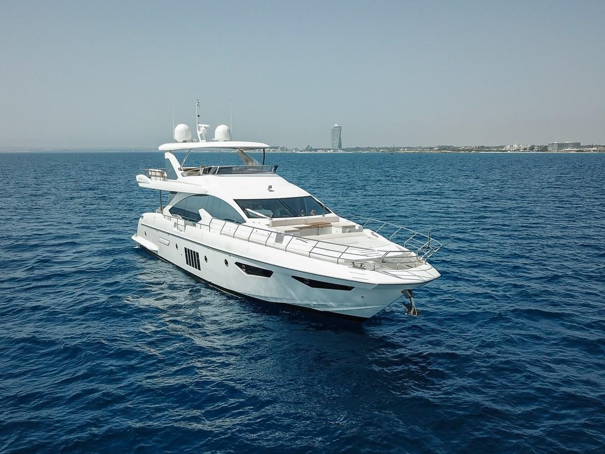 a white yacht in the water aboard ALINA Yacht for Sale