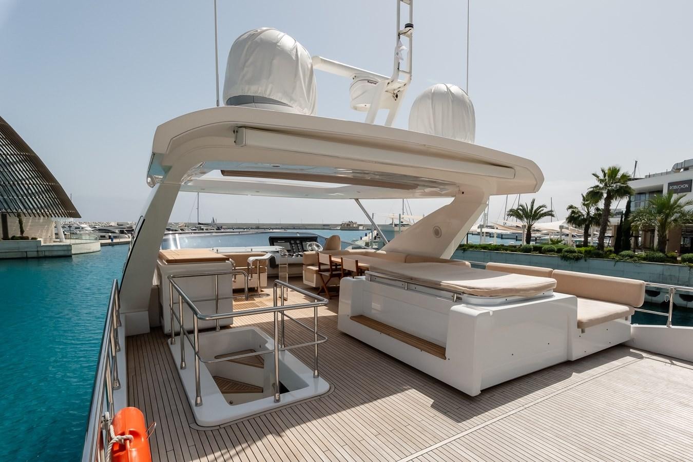 a large white boat on a dock aboard ALINA Yacht for Sale