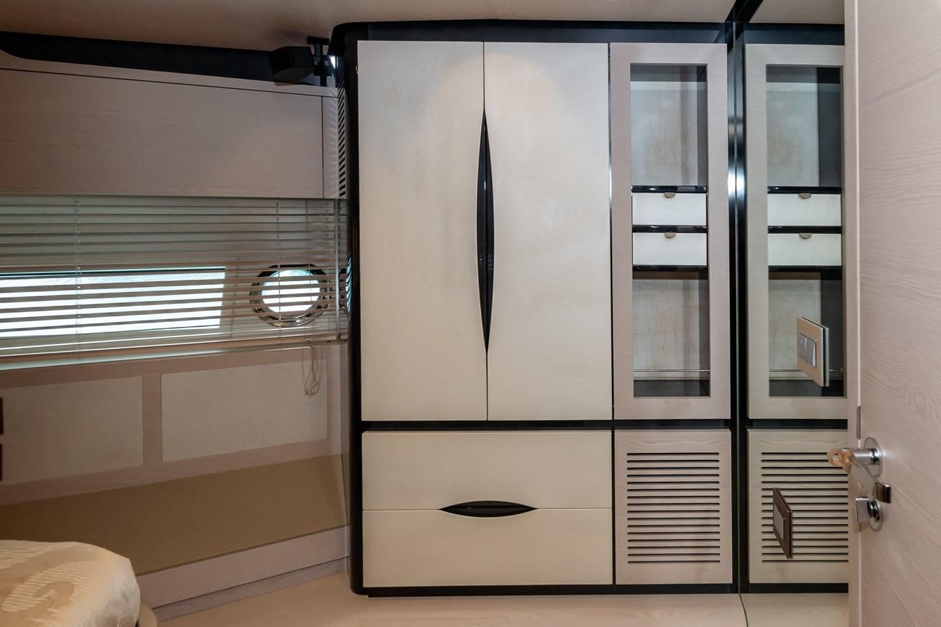 a closet with a door aboard ALINA Yacht for Sale