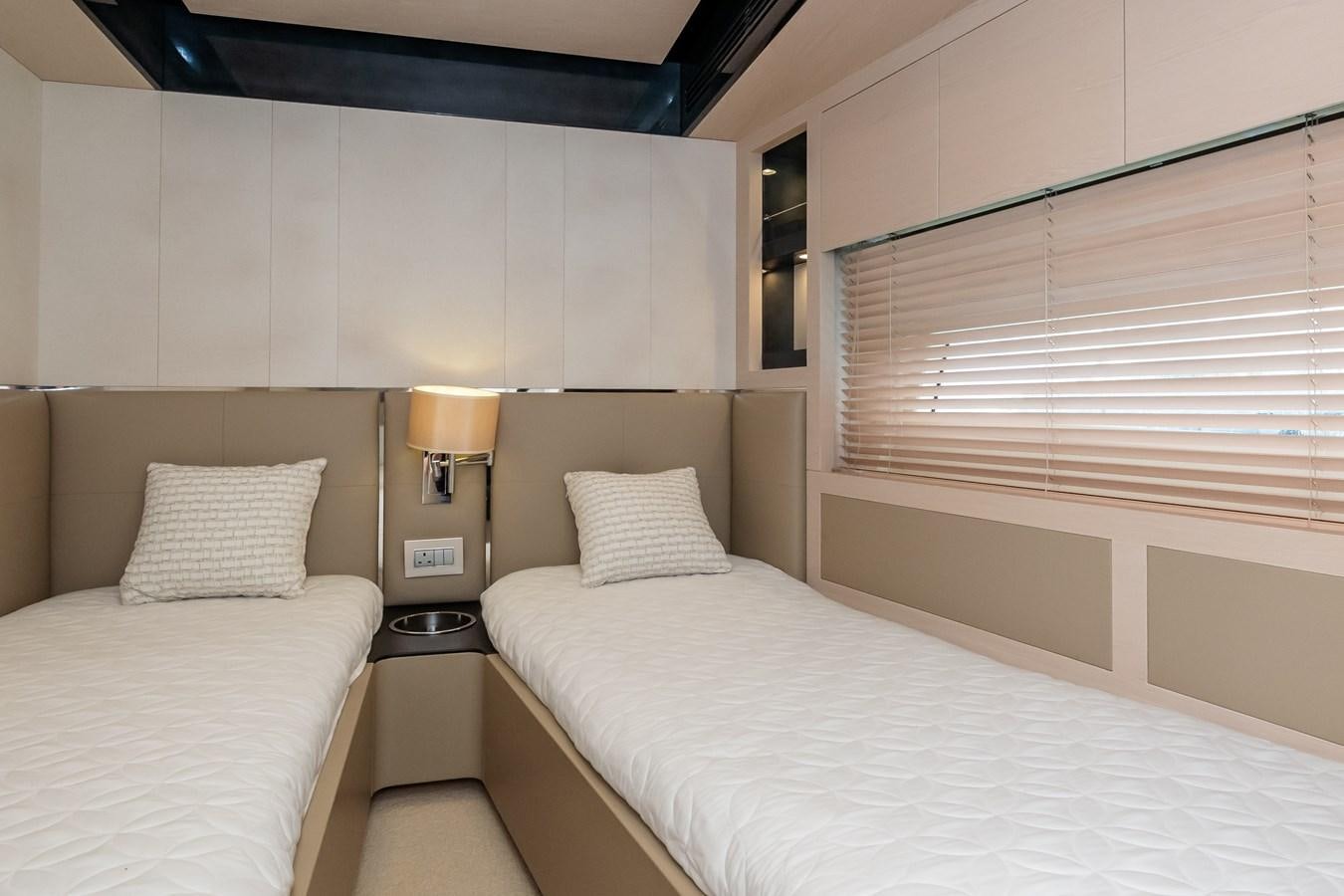 a couple of beds in a room aboard ALINA Yacht for Sale