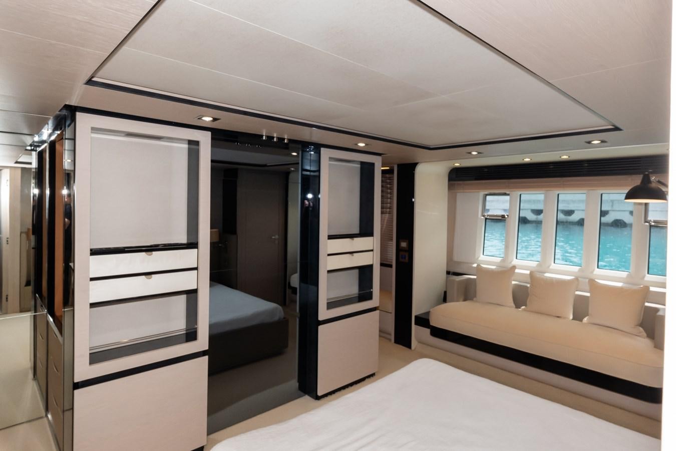 a room with a bed and a couch aboard ALINA Yacht for Sale