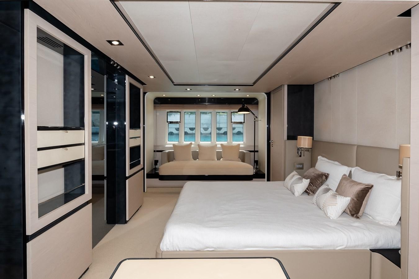 a bedroom with a large bed aboard ALINA Yacht for Sale