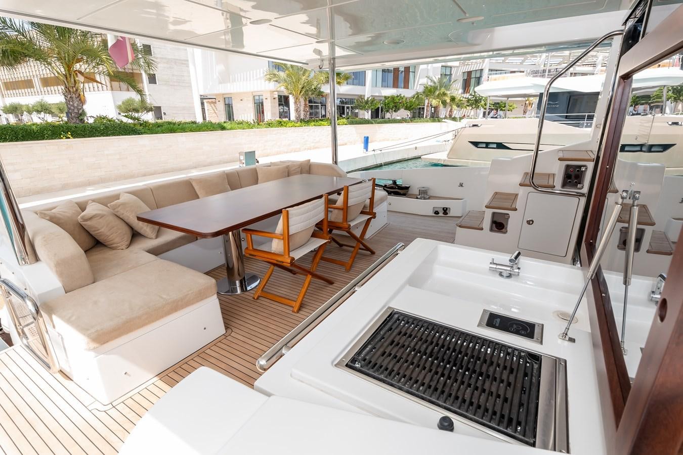 a room with a couch and a table aboard ALINA Yacht for Sale