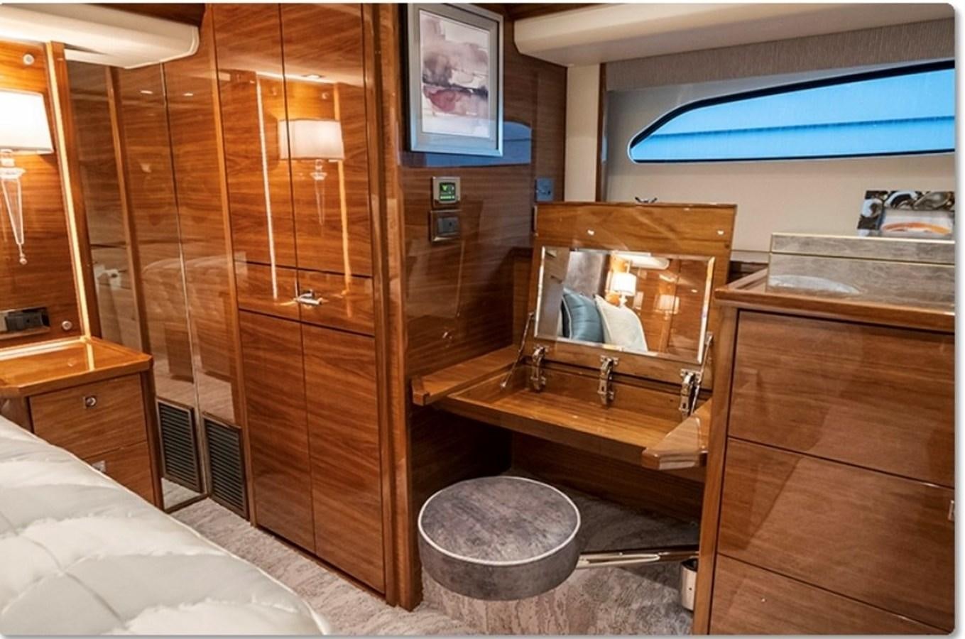 a room with a glass door aboard FREAK SHOW Yacht for Sale