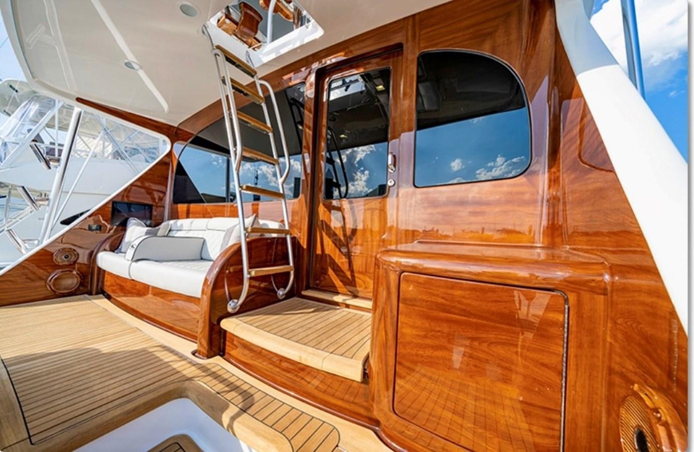 a bunk bed with a white mattress aboard FREAK SHOW Yacht for Sale