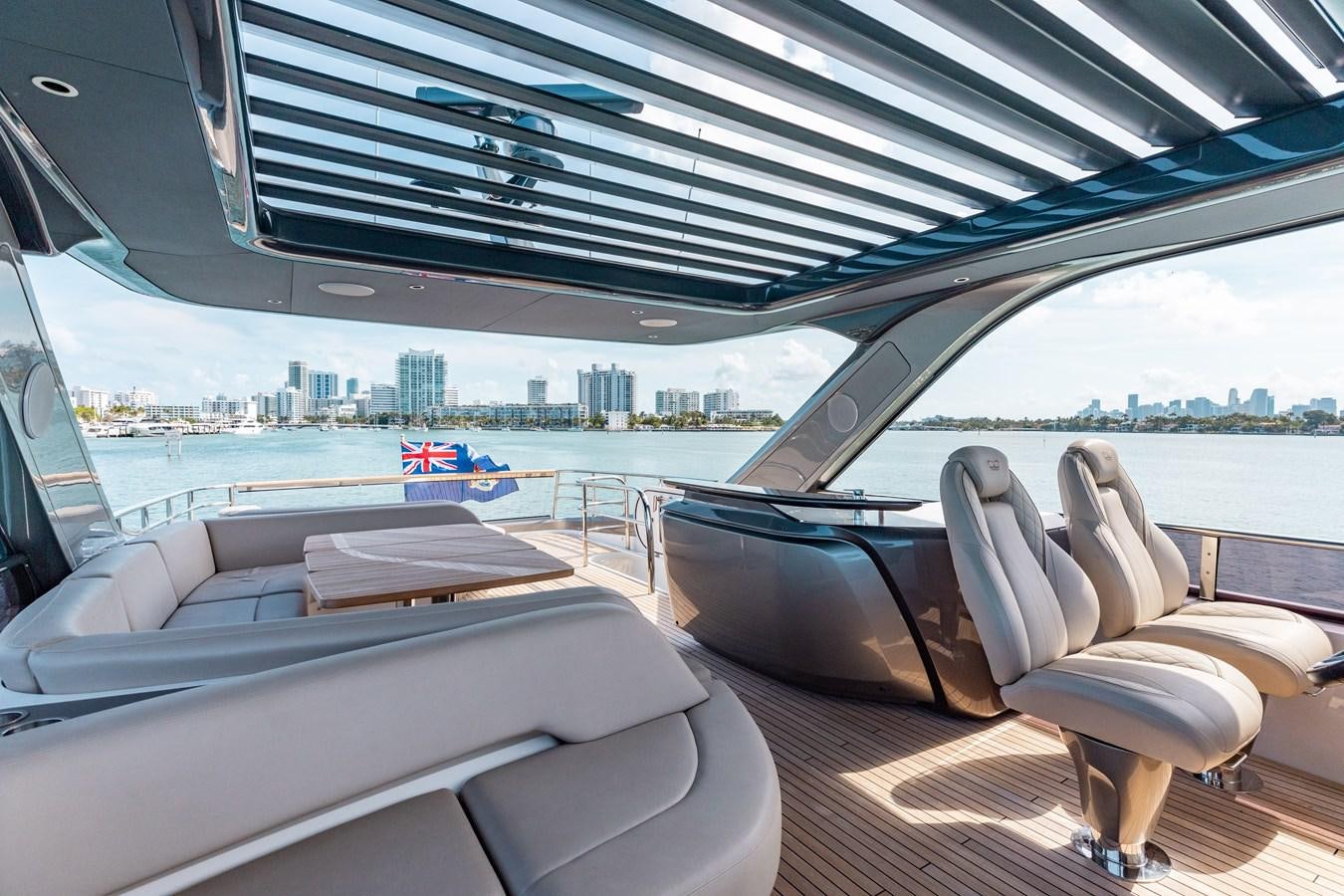 inside of a car aboard DROPLET Yacht for Sale