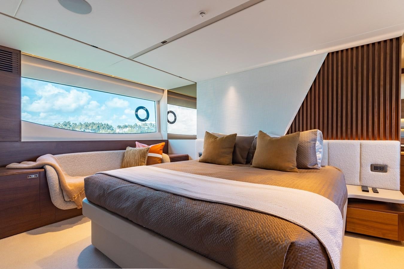 a bed in a room aboard DROPLET Yacht for Sale
