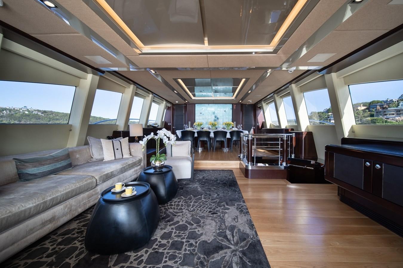a living room with a large rug aboard QUANTUM Yacht for Sale