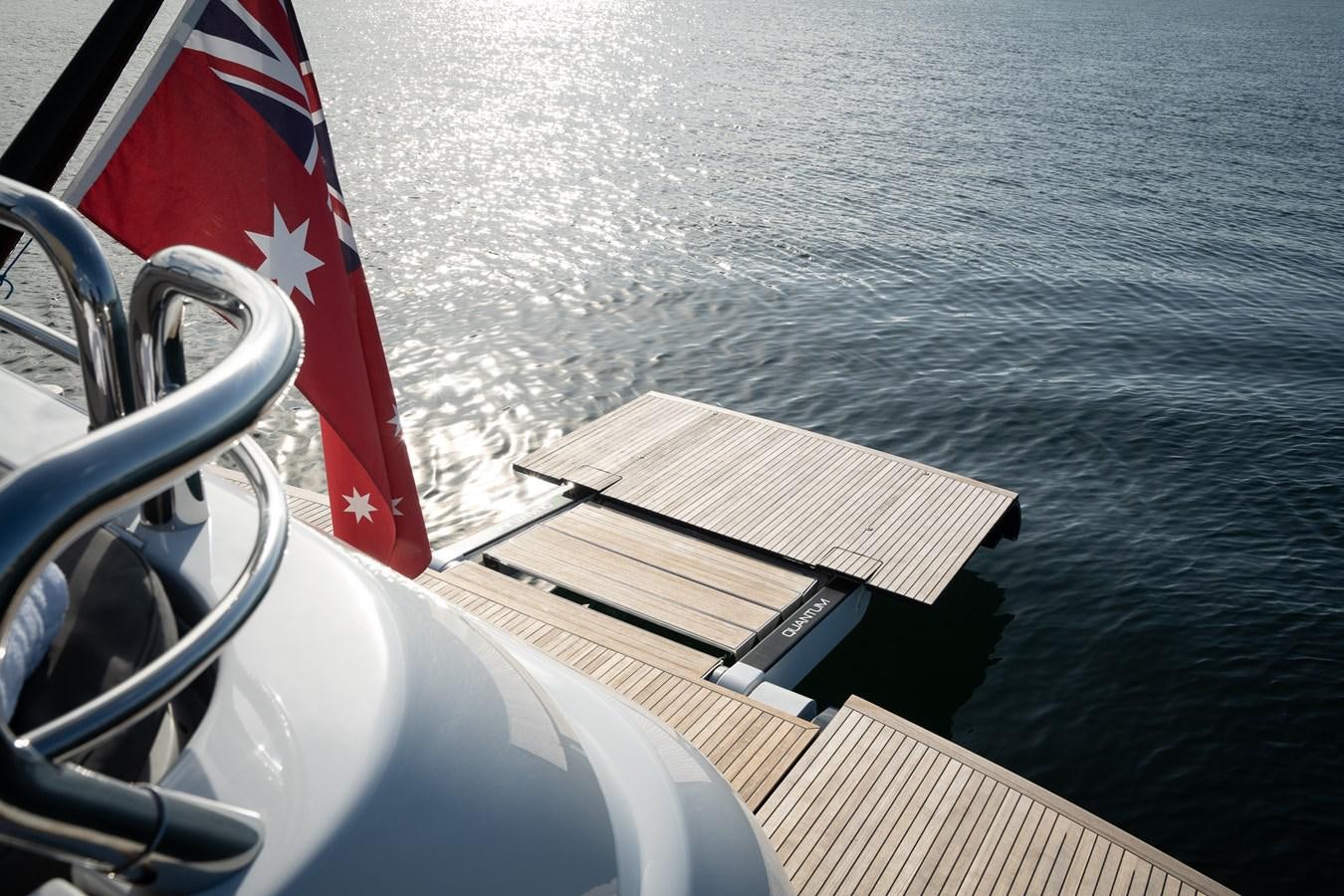 a book and a flag on a boat aboard QUANTUM Yacht for Sale