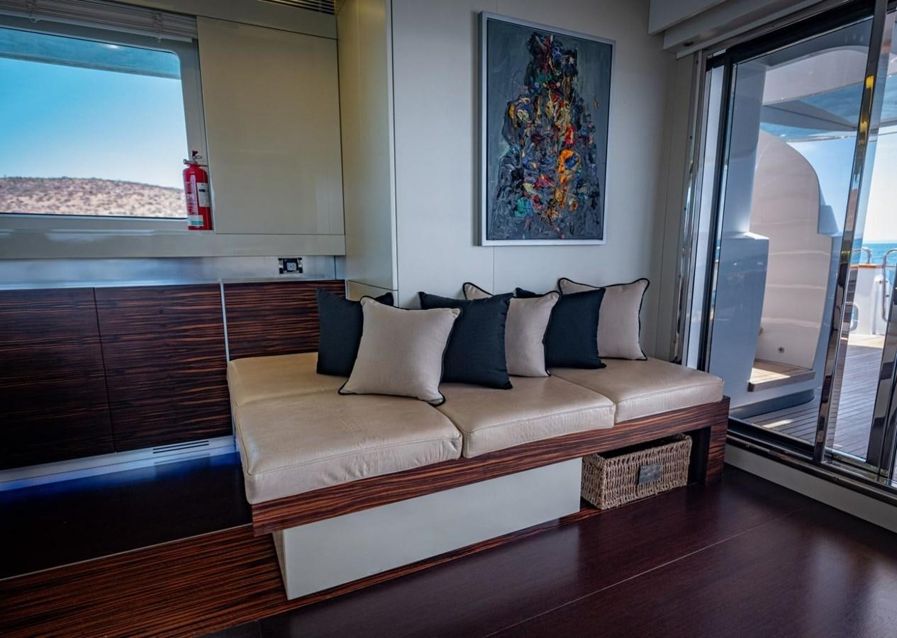 a couch in a room aboard CANADOS FLYBRIDGE FAST Yacht for Sale
