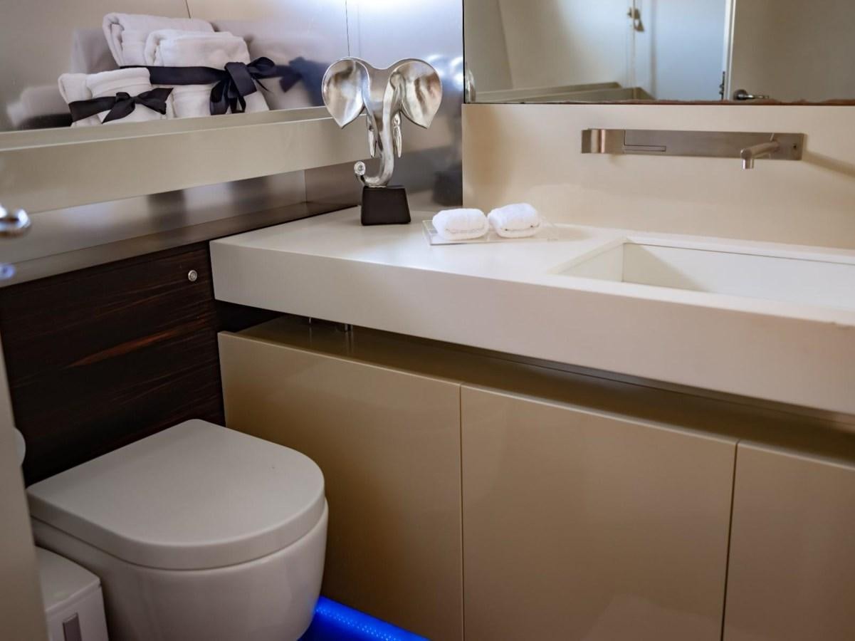 a bathroom with a sink and a toilet aboard CANADOS FLYBRIDGE FAST Yacht for Sale