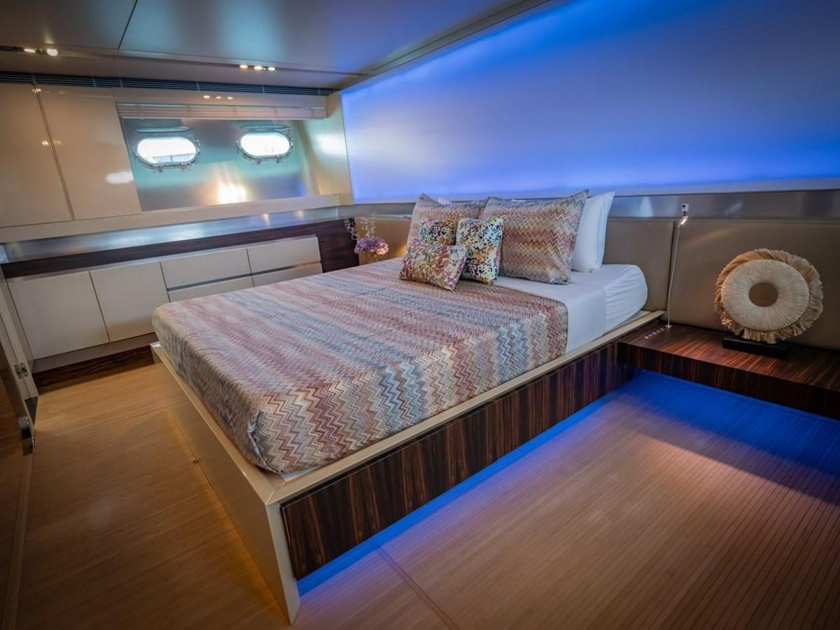 a bed in a room aboard CANADOS FLYBRIDGE FAST Yacht for Sale