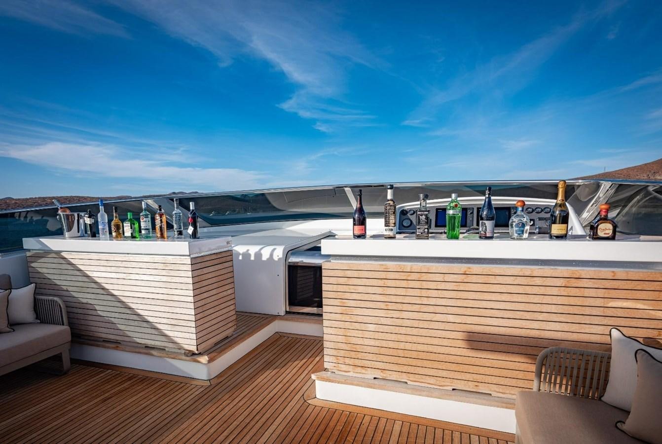 a large open kitchen with a view of the ocean aboard CANADOS FLYBRIDGE FAST Yacht for Sale