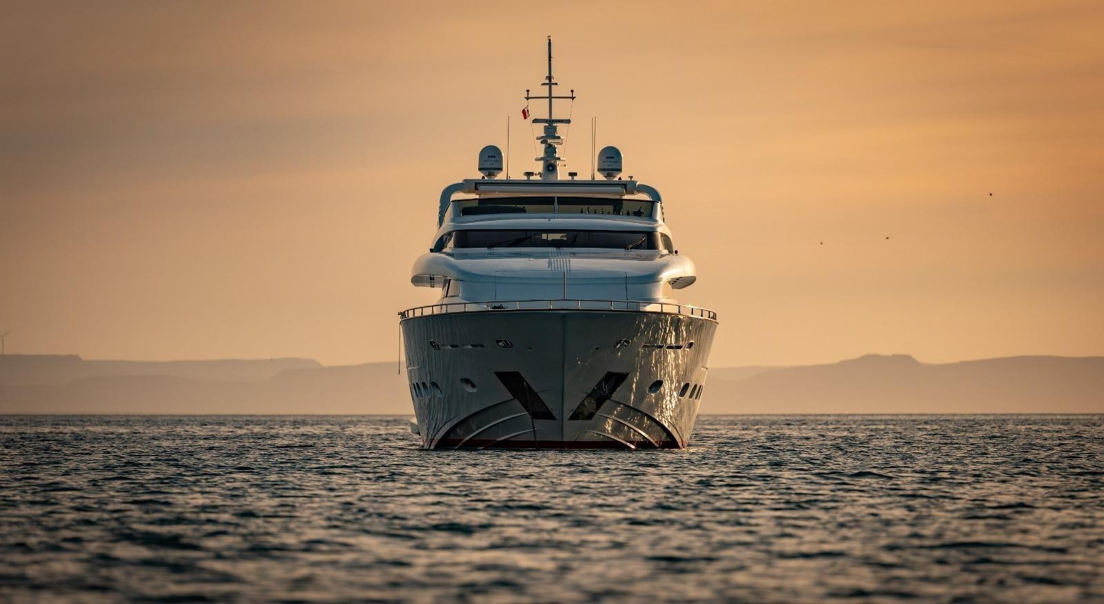 a large ship in the water aboard CANADOS FLYBRIDGE FAST Yacht for Sale