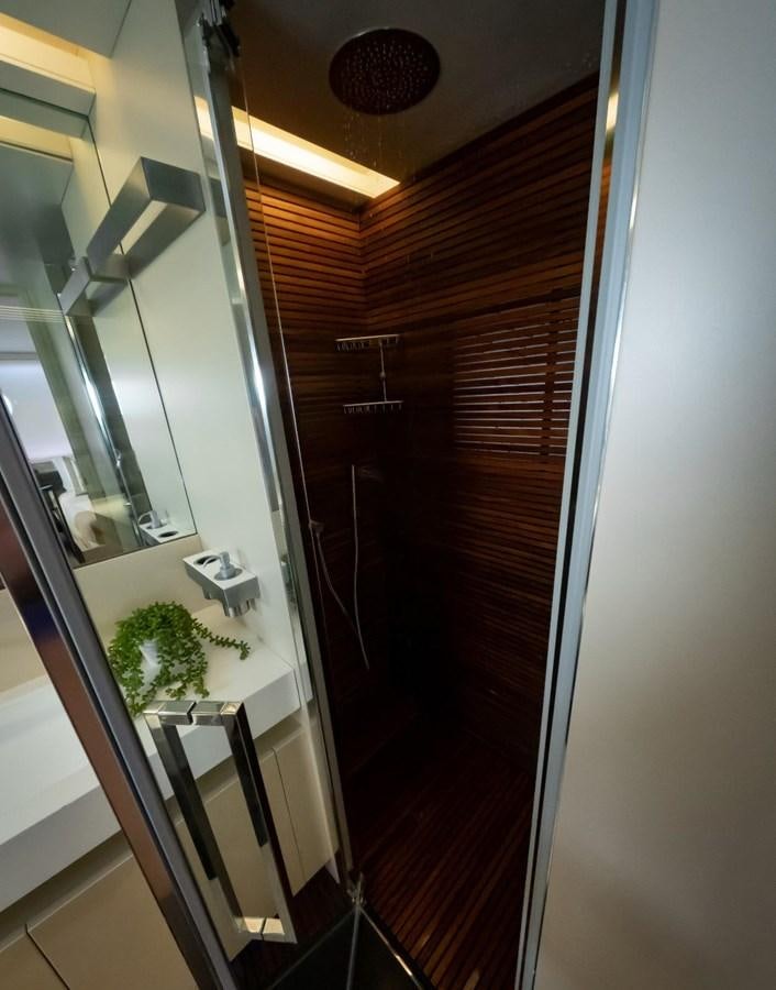 a hallway with a potted plant aboard CANADOS FLYBRIDGE FAST Yacht for Sale